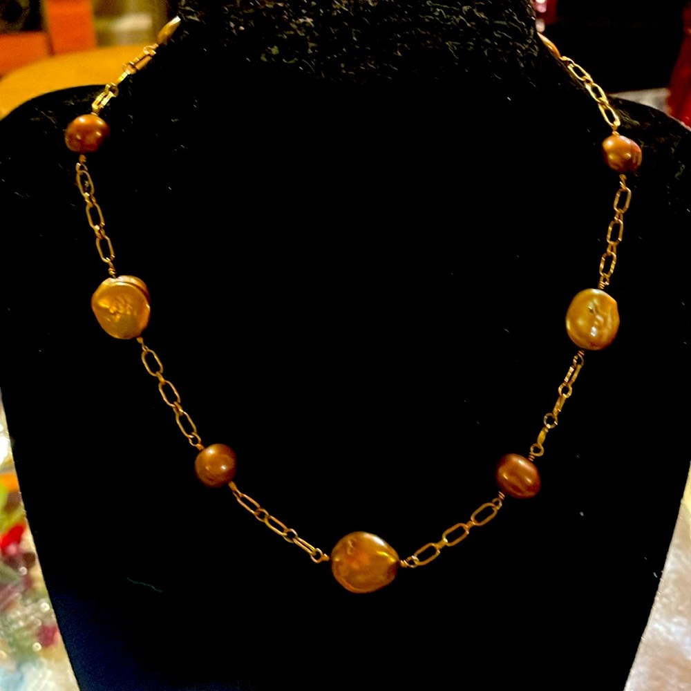 Gold chain and bronze pearl necklace